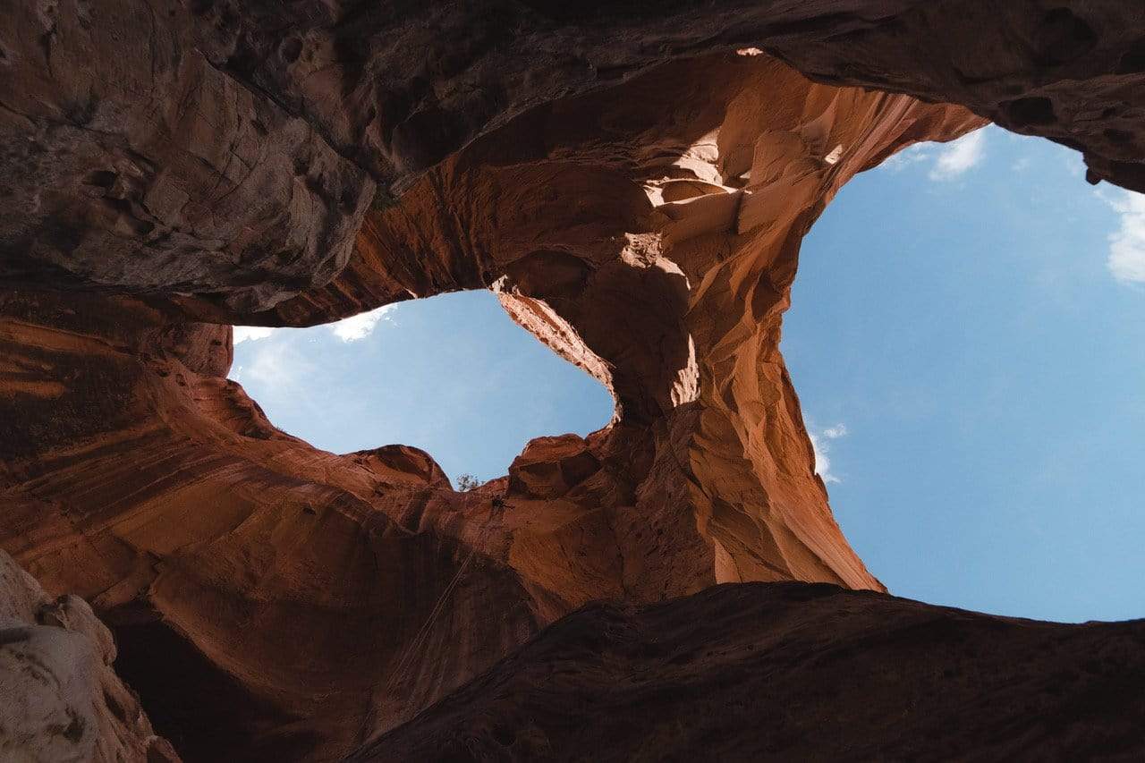 Descending Down Cassidy Arch, Utah:<br>"Canyons tend to destroy things."